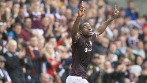 Uche Ikpeazu celebrates scoring for Hearts
