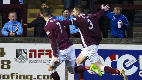 Michael Dunlop (right) celebrates scoring for Stenhousemuir