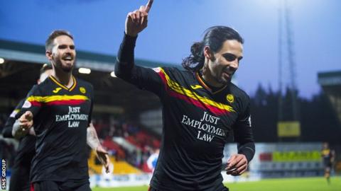Partick Thistle's Ryan Edwards celebrates after making it it 3-1 to the visitors