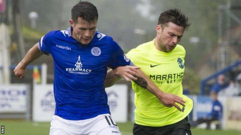 Queen of the South's Dale Hilson (left) with Lewis Stevenson