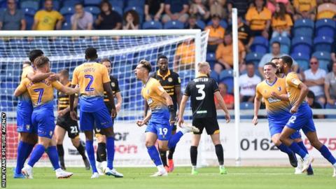 Tyler Walker celebrates his opening goal