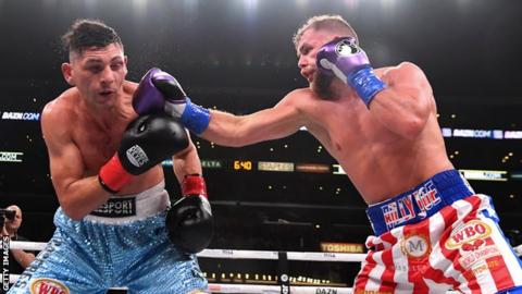 Marcelo Esteban Coceres (left) is punched by Billy Joe Saunders (right)