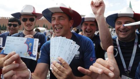 France fans show off tickets to the World Cup final