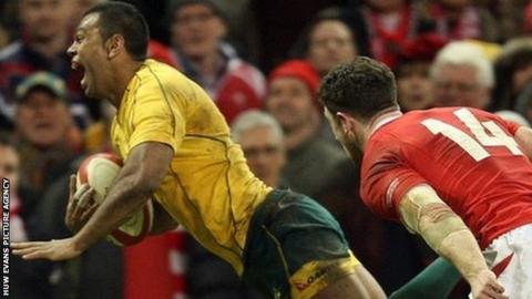 Fly-half Kurtley Beale dives over for a try with the final move of the game to give Australia a 14-12 win over Wales in 2012