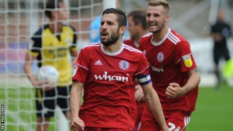 Accrington Stanley captain Seamus Conneely celebrates scoring a goal