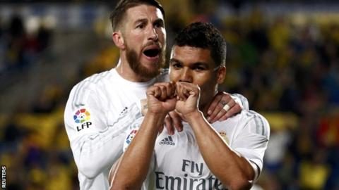 Casemiro celebrates his winner with fellow scorer Sergio Ramos