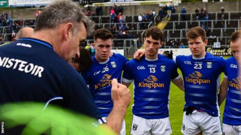 McGleenan talks to his Cavan team after their 2017 Ulster Championship defeat by Monaghan