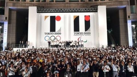 The logo for Tokyo 2020 is unveiled outside Tokyo City Hall