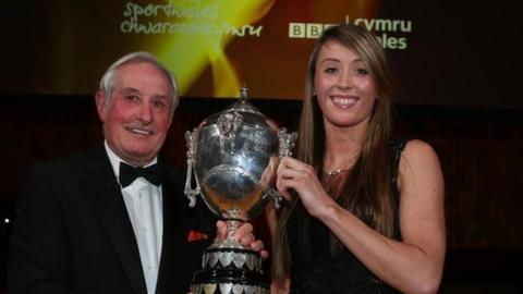 Taekwondo athlete Jade Jones receives her award from rugby great Gareth Edwards