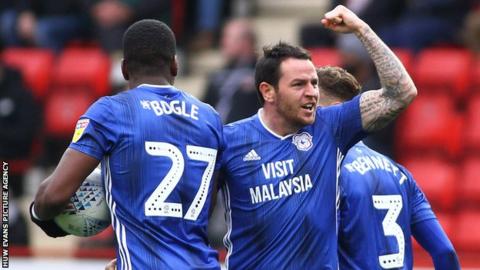 Lee Tomlin celebrates after scoring for Cardiff City