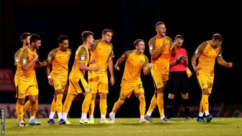 League Two side Newport beat Gillingham on penalties in the first round and will play West Ham in round two