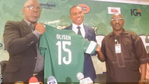 Sunday Oliseh (centre) is unveiled as the new Nigeria coach