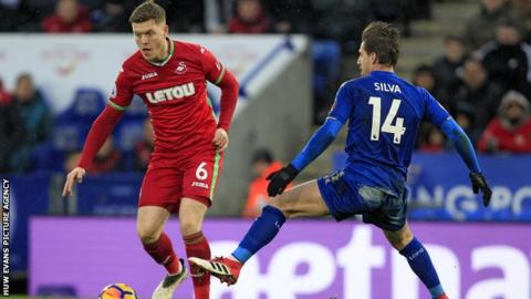 Alfie Mawson in action against Leicester