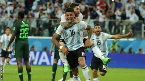 Argentina's Marcos Rojo celebrates scoring against Nigeria