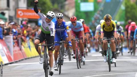 Edvald Boasson Hagen (left) wins the opening stage, ahead of Team Deceuninck-QuickStep's Phillipe Gilbert (centre) and Wout van Aert of Team Jumbo-Visma
