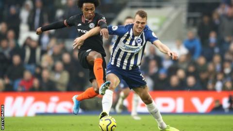 Dan Burn: Brighton defender signs new deal until June 2023 - BBC Sport