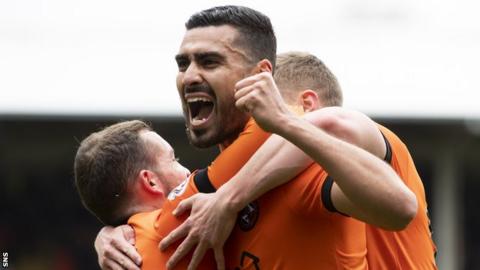 Rachid Bouhenna celebrates with Dundee United