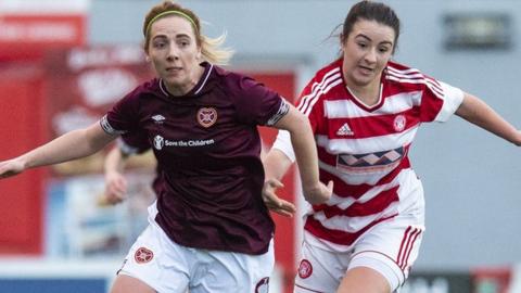 Hearts' Rachel Walkingshaw competes with Hamilton's Megan Quigley
