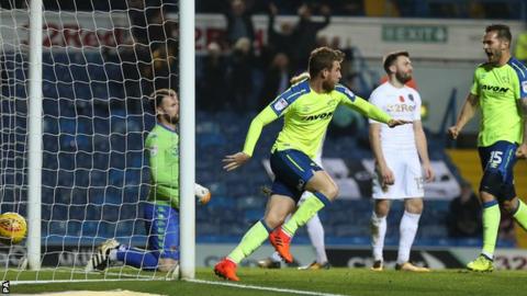 Sam Winnall celebrates his first goal against Leeds United