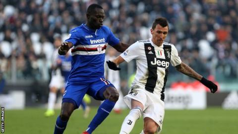 Omar Colley in action for Sampdoria against Mario Mandzukic of Juventus