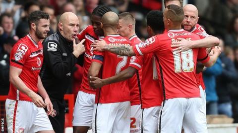 Walsall's players ran to the side of their pitch to celebrate their third goal against Fleetwood on Monday with boss Jon Whitney