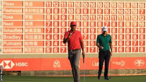 Tony Finau celebrates his birdie on the 18th