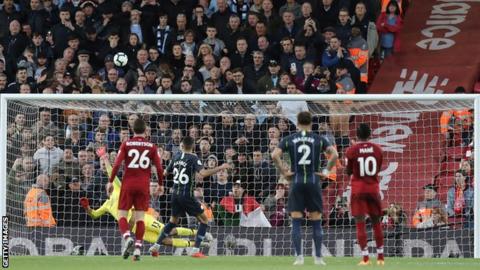 Riyad Mahrez fires his penalty over the bar at Anfield last season