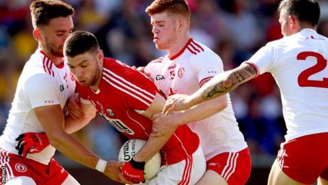 There's no way out for Cork forward Luke Connolly as a trio of Tyrone players close in