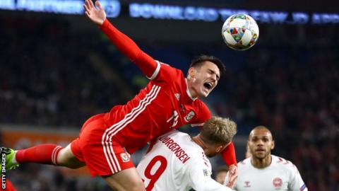 Connor Roberts in action for Wales against Denmark
