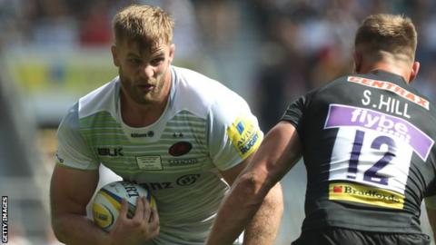 Saracens lock George Kruis takes on Sam Hill of Exeter