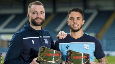 James McPake and Declan McDaid show off their monthly awards