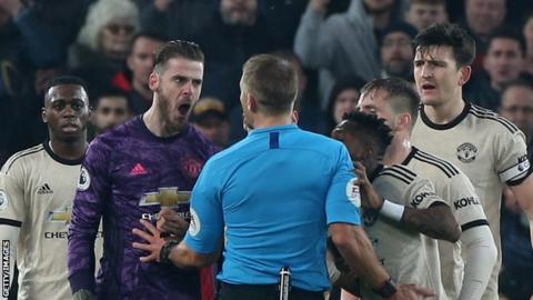 Manchester United keeper David de Gea was booked after he confronted the referee