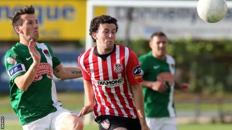 Cork midfielder Liam Millar closes in on Derry's Barry McNamee