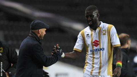 Cisse scored three goals in 68 appearances for MK Dons