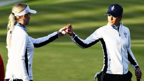 Charley Hull and Azahara Munoz playing for Europe at the Solheim Cup