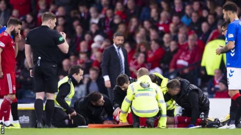 Andrew Considine receives medical attention