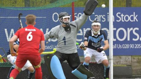 Lisnagarvey keeper John Tormey saves against Monkstown