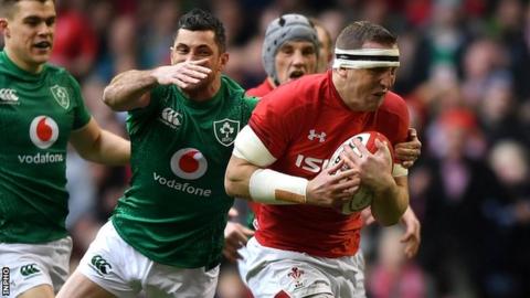Hadleigh Parkes runs through to score Wales' first try in their 25-7 win over Ireland at the Principality Stadium