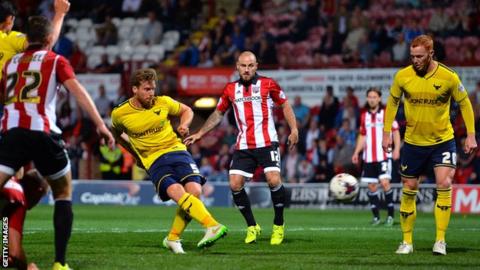 John Mullins scores