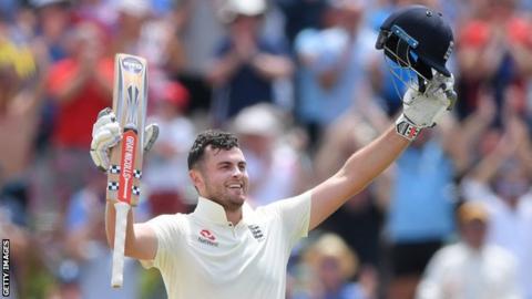 England opener Dom Sibley raises his bat and helmet to celebrate his maiden Test century against South Africa