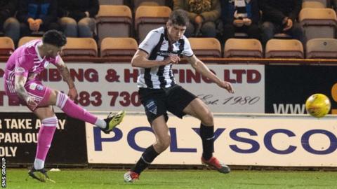 Declan McDaid curls in the only goal of the game at East End Park