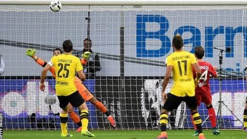 Admir Mehmedi (right) scores for Bayer Leverkusen against Borussia Dortmund