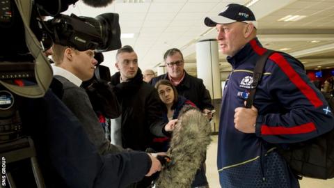 Vern Cotter talks to reporters at Edinburgh Airport