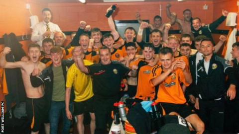 Fort William FC celebrating win in dressing room