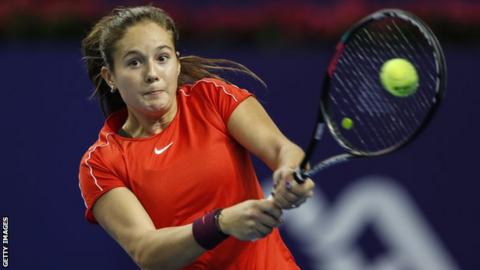 Daria Kasatkina plays a shot