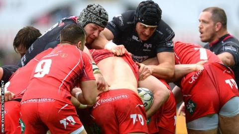 Scarlets and Ospreys get to grips with each other during a Pro12 match