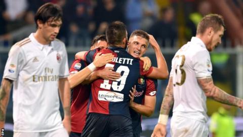 Genoa celebrate goal against Ac Milan