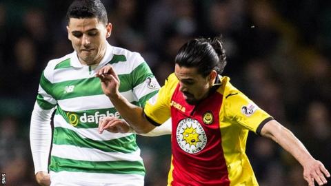 Celtic's Tom Rogic and Partick Thistle's Ryan Edwards contest a ball