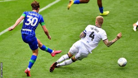 Kieran Dowell scores against Hull while on loan at Wigan