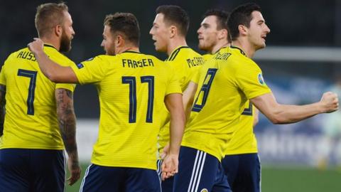 Kenny McLean (right) after scoring his first international goal